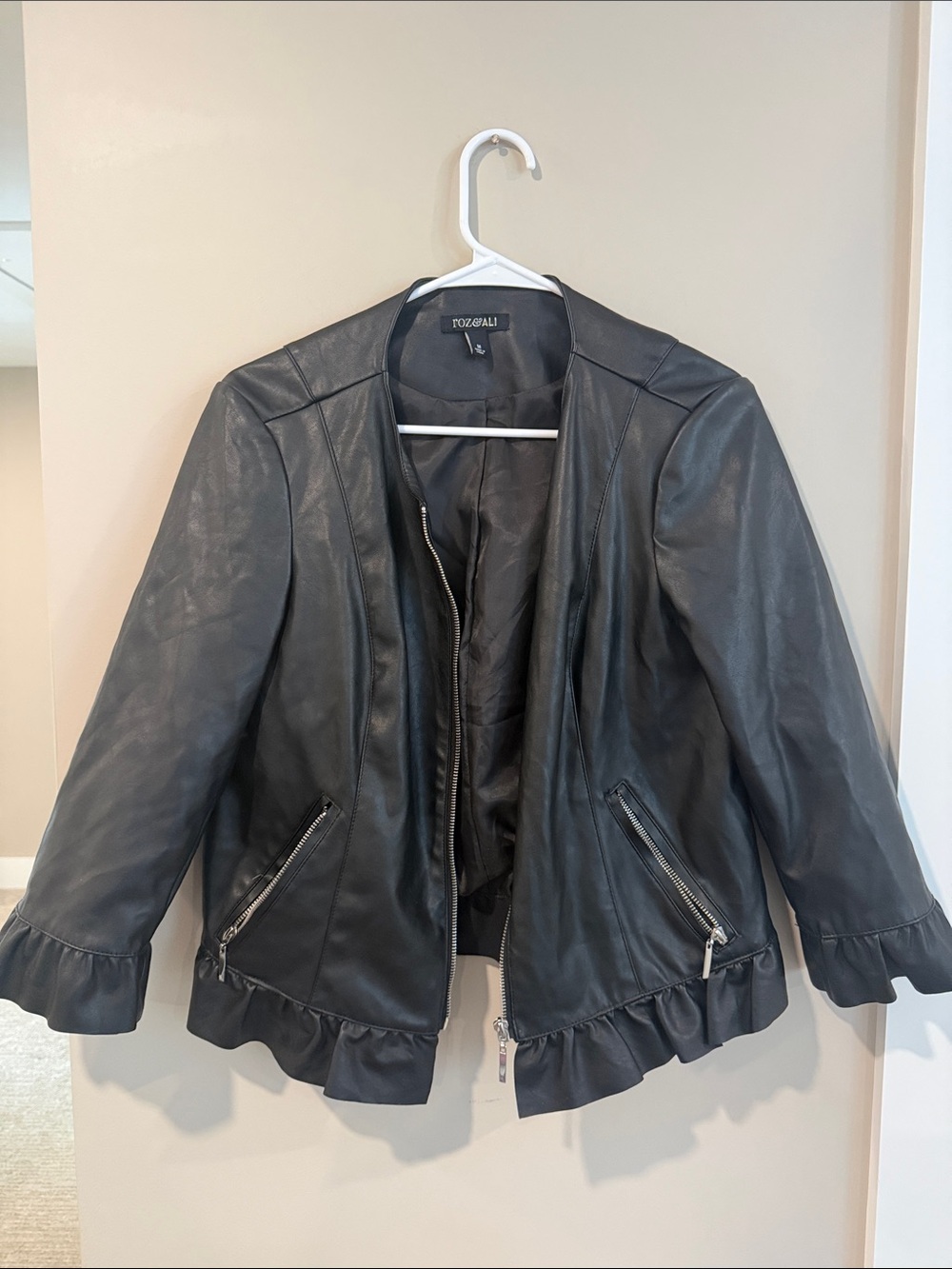 Roz & Ali Black Faux Leather Ruffle-Hem Jacket with Zip Pockets